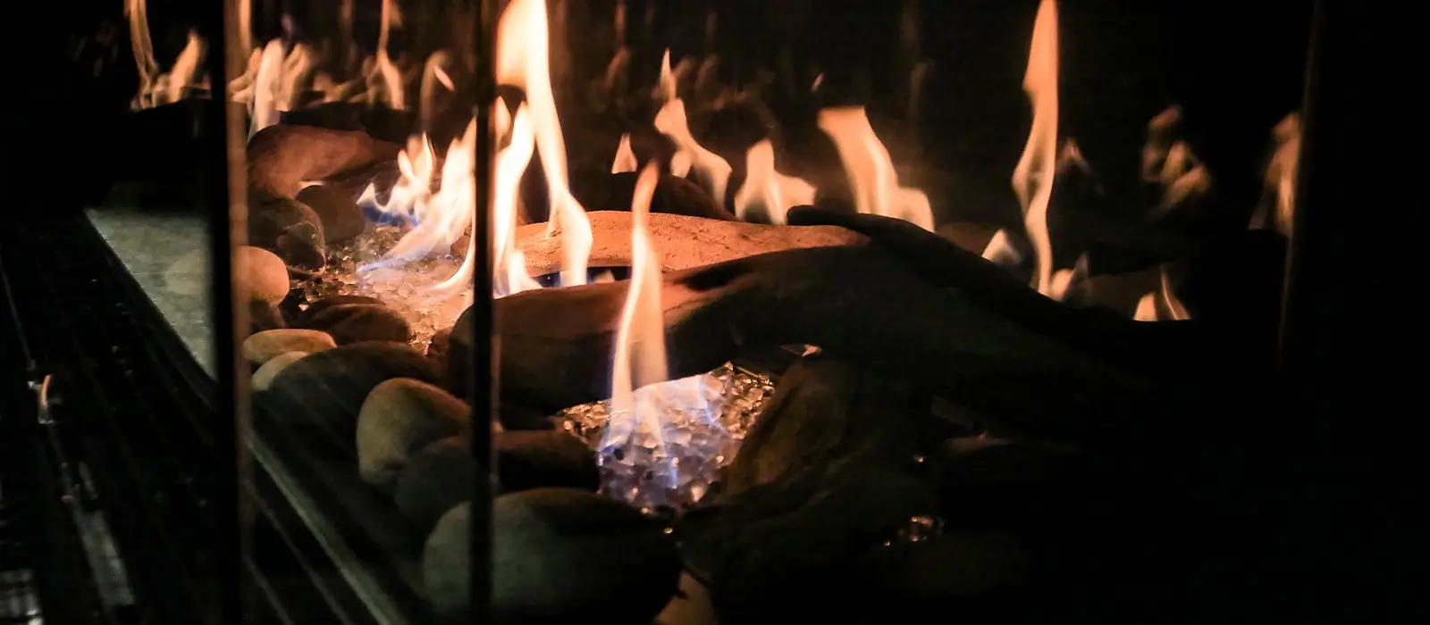 Genesis screen-free gas fireplace in a contemporary architectural interior.